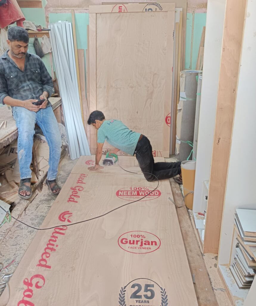 workers manufacturing custom furniture in workshop